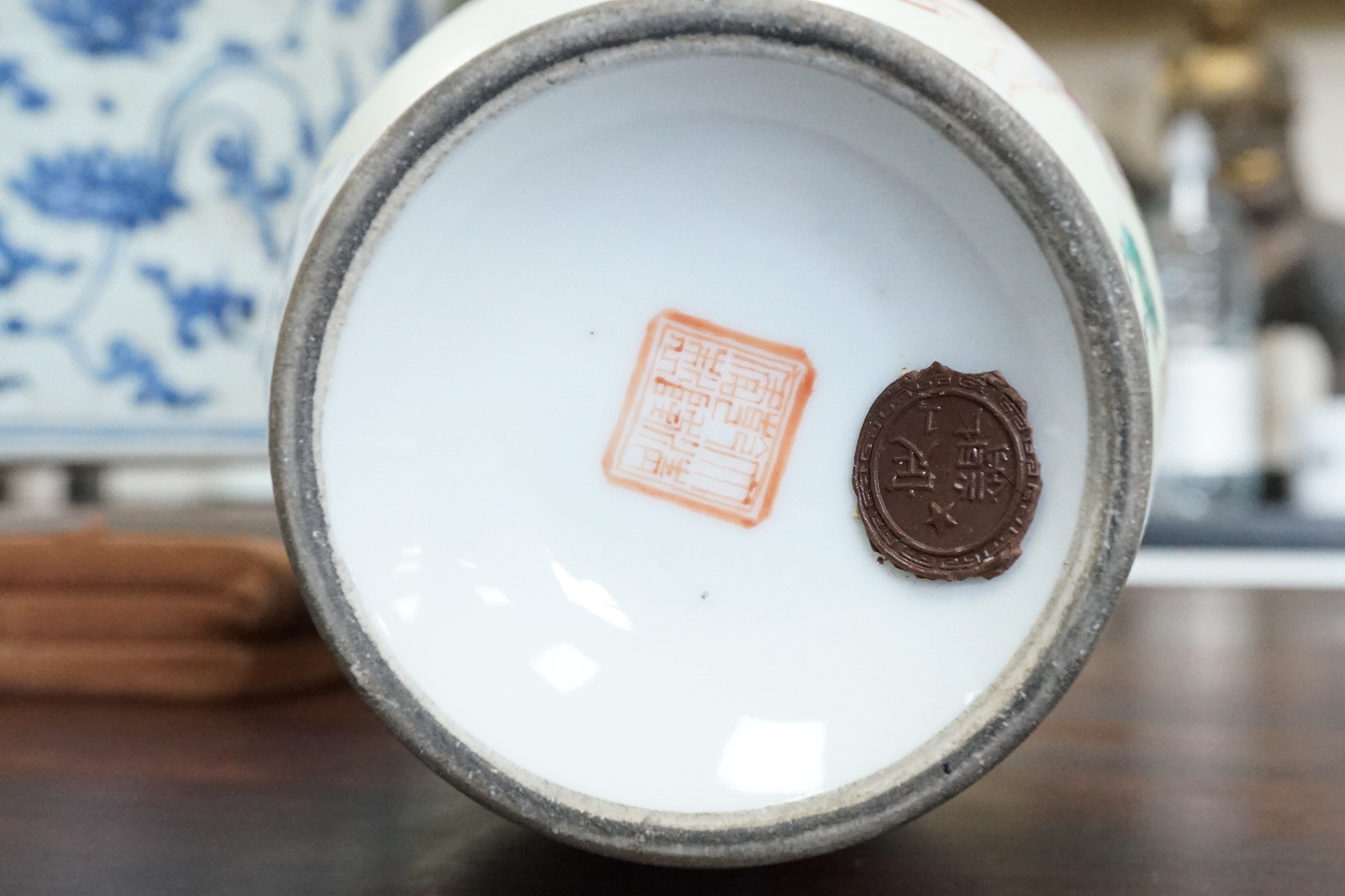 A Chinese famille rose ‘Liu Hai’ bottle vase, Qianlong six character seal mark but Republic period